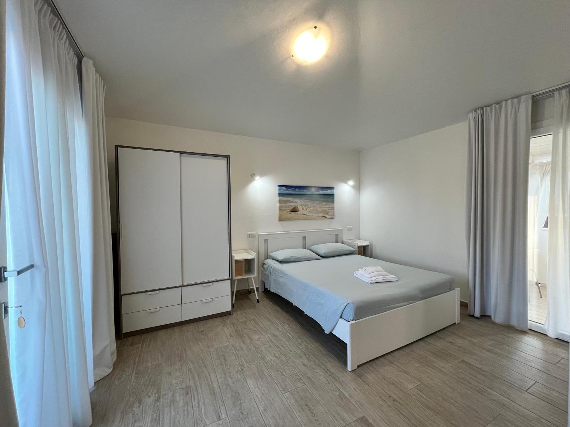 Case Vacanze "Bianco Mare" Porto Pino Εξωτερικό φωτογραφία