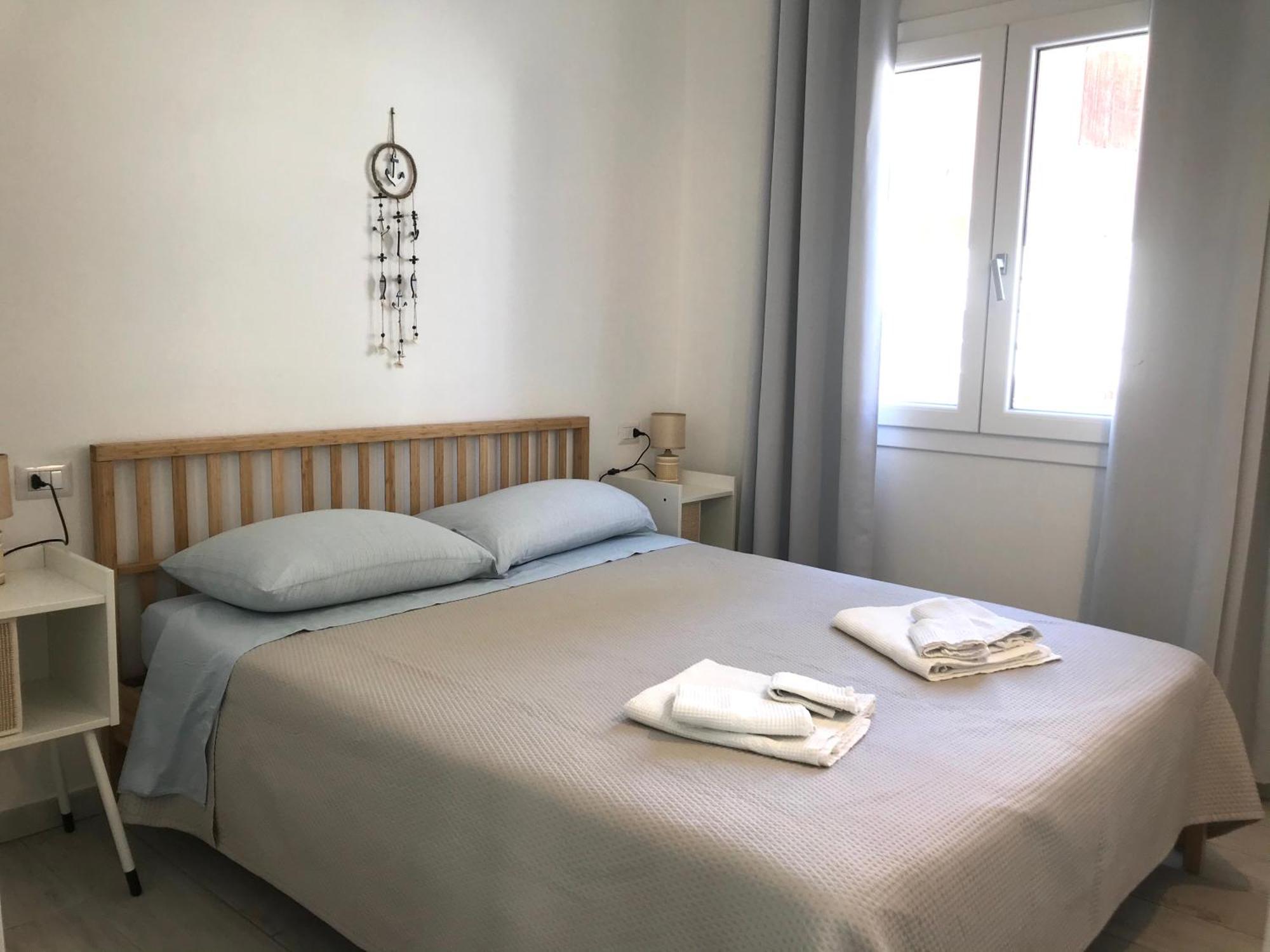 Case Vacanze "Bianco Mare" Porto Pino Δωμάτιο φωτογραφία