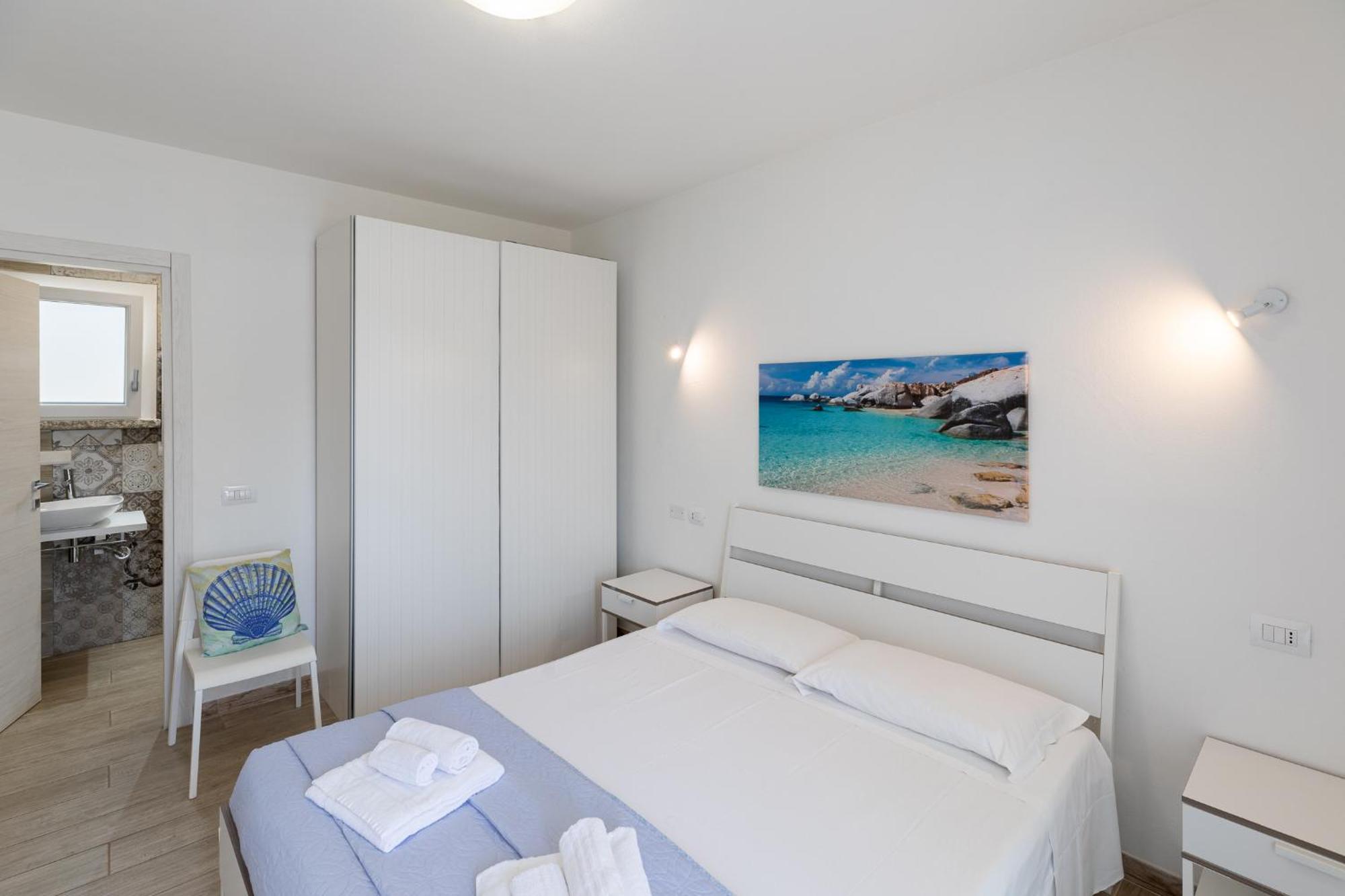 Case Vacanze "Bianco Mare" Porto Pino Δωμάτιο φωτογραφία