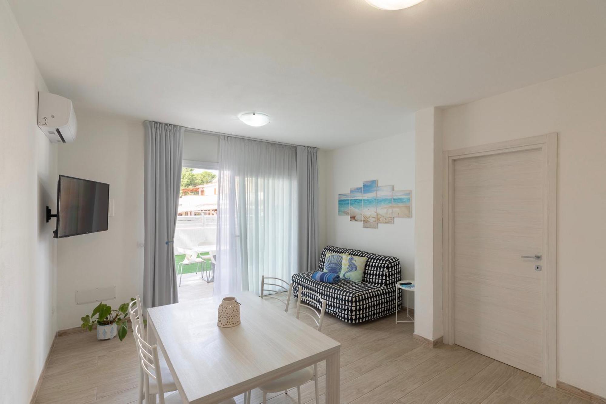 Case Vacanze "Bianco Mare" Porto Pino Δωμάτιο φωτογραφία