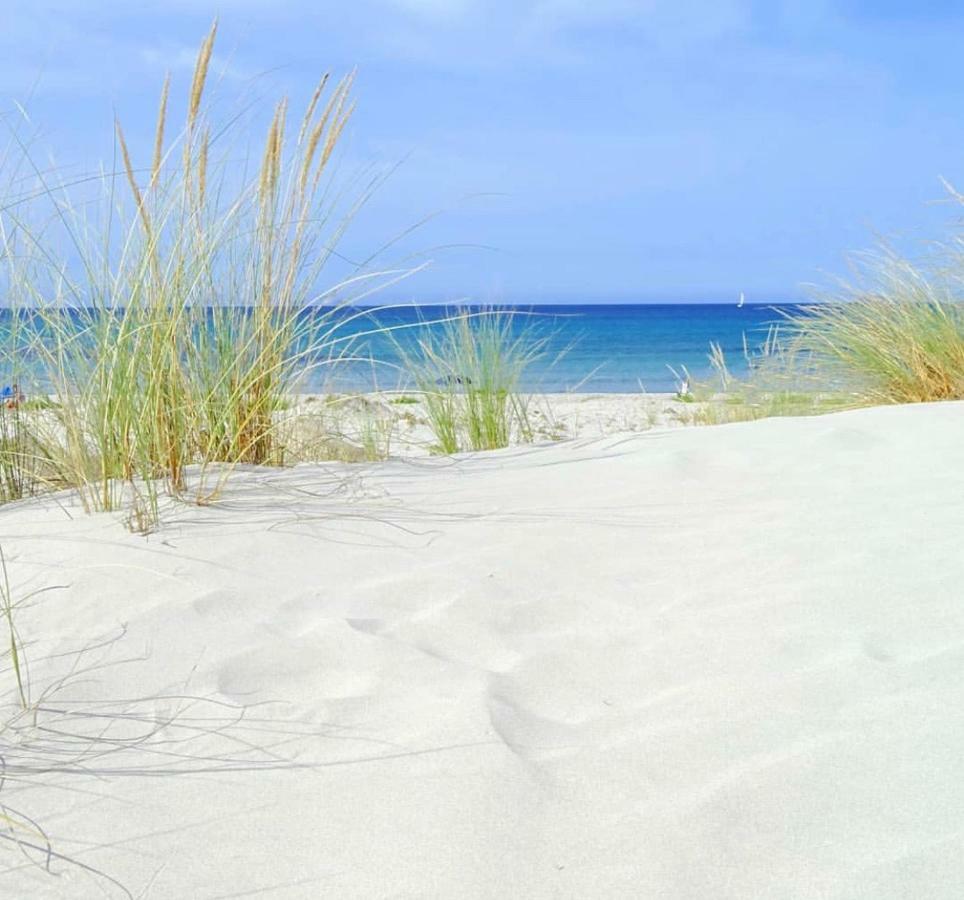 Case Vacanze "Bianco Mare" Porto Pino Εξωτερικό φωτογραφία